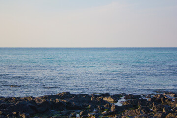 
This is a Jeju Island beach with basalt rocks.