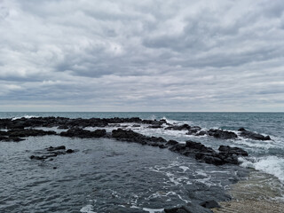 
This is the Jeju Island beach with rough waves.