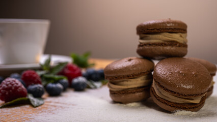 chocolate desserts on a light background close-up, with raspberries and blueberries. Christmas festive background