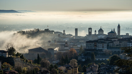 Bergamo, one of the most beautiful city in Italy. Amazing aerial landscape of the fog rises from...