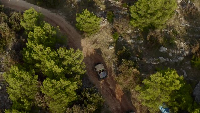 Buggies Driving Off-Road Near Pustinja Blaca In Croatia - Aerial Drone Shot