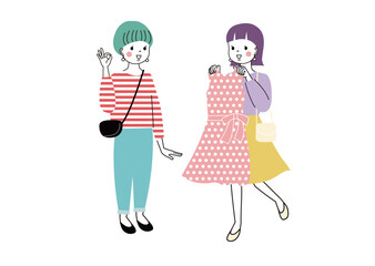 洋服が似合うかどうか友達に尋ねている女性　OKを出している女性