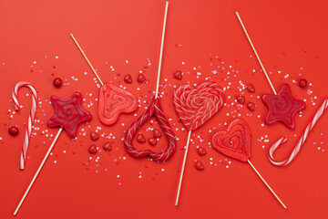 Various red candy sweets lollipops