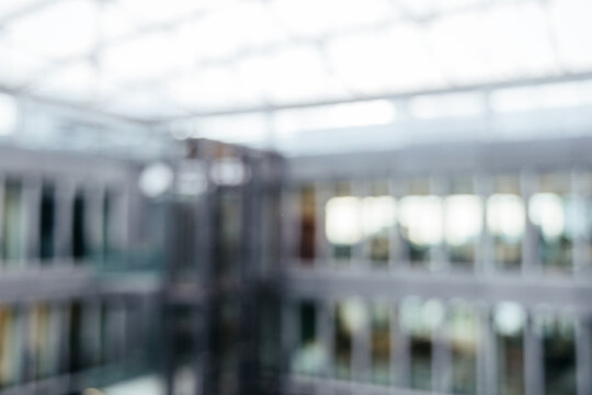 Beautiful blurred background of a light modern office with beautiful lighting. Perfect as background for portraits or LinkedIn. 