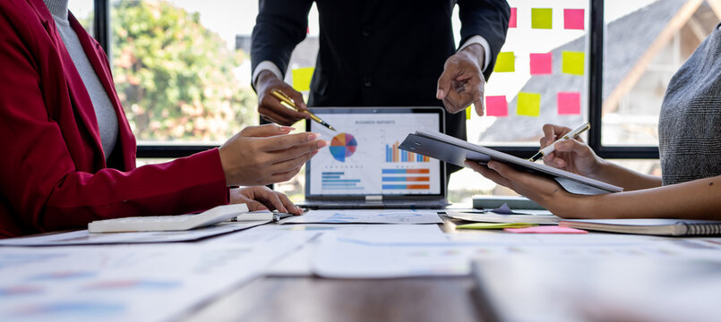 Team Of Business working at the office with documents on desk, planning analyzing the financial report, business plan investment, Consultant, finance analysis concept