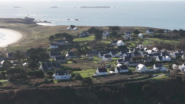 Town of Houat in the island of the same name off Bay of Quiberon France Atlantic coast of Brittany, Aerial pan left rising shot