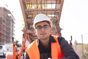 technician male with helmet working outside