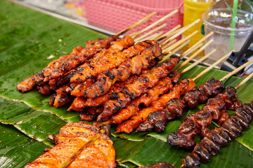 Heap of grilled skewer chicken offals for sat at street food