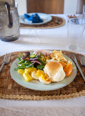 Colorful plate of food featuring traditional Thanksgiving foods
