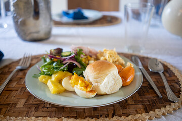 Colorful plate of food featuring traditional Thanksgiving foods