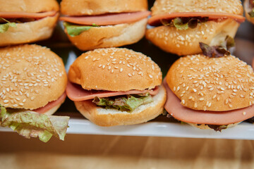 Close-up of homemade cheeseburger serving on plate