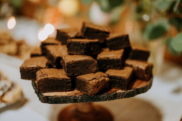 display of brownies on a desert table at a wedding