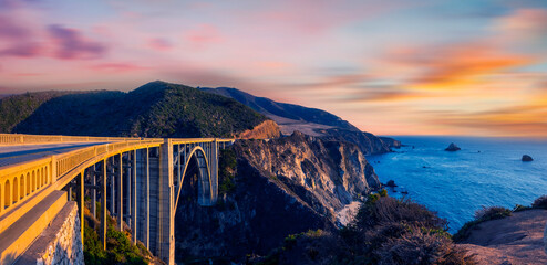 Bixby Bridge ,Rocky Creek Bridge,  and Pacific Coast Highway at sunset near Big Sur in California,...