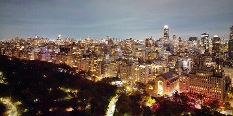 Obraz premium New York City famous top view. Night New York City from above. Night New York panorama, NYC skyline at twilight. Manhattan buildings from drone. New York building skyscrapers skyline from above.