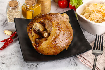 Baked pork knee with spices