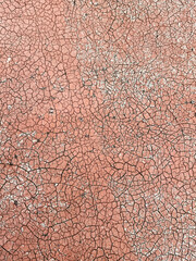 Old covering on a sports ground as an abstract background. Texture