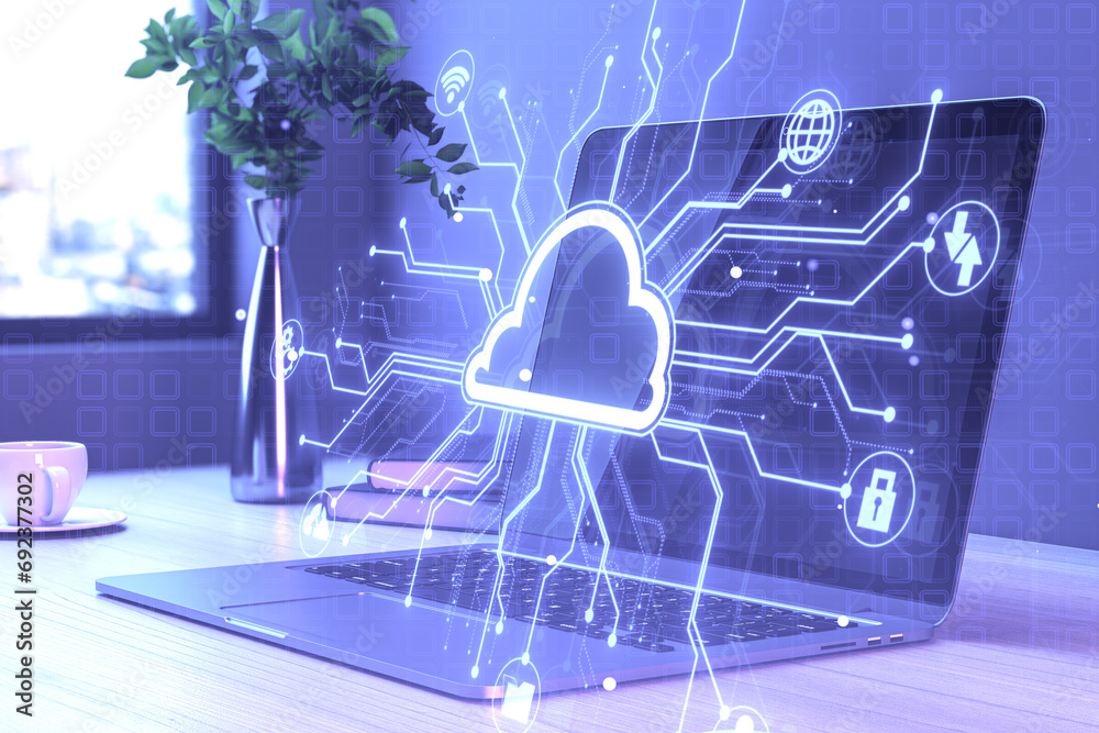 Poster close up of laptop on desk with coffee cup, vase and creative digital circuit cloud on blue backgrou