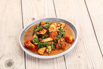Chicken with tomato and spinach