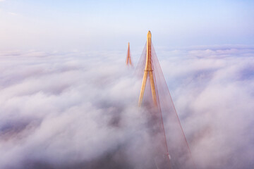 Low clouds are a rare phenomenon in the Mekong Delta. In the photo is the Can Tho bridge