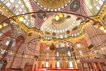 Fototapeta na wymiar Istanbul, Turkey - Aug 1, 2023: Suleymaniye Mosque in Istanbul. Architectural masterpiece and symbol of Ottoman grandeur. With its majestic domes and towering minarets, commissioned by Sultan Suleyman
