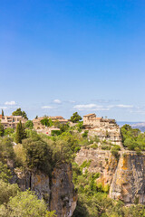 Fototapeta na wymiar Historic buildings on the cliffs of mountain village Siurana, Spain
