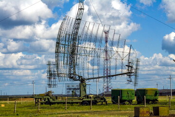 Radio relay military communications antenna against a blue sky - obrazy, fototapety, plakaty