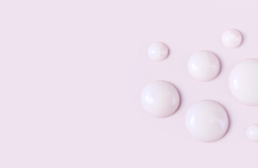 cosmetic smears drops of cream texture on pastel pink background
