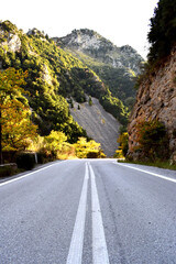 Vertical photograph of historic mountain road between Sparta and Kalamata in autumn colors, Peloponnese Peninsula, Greece, Europe
