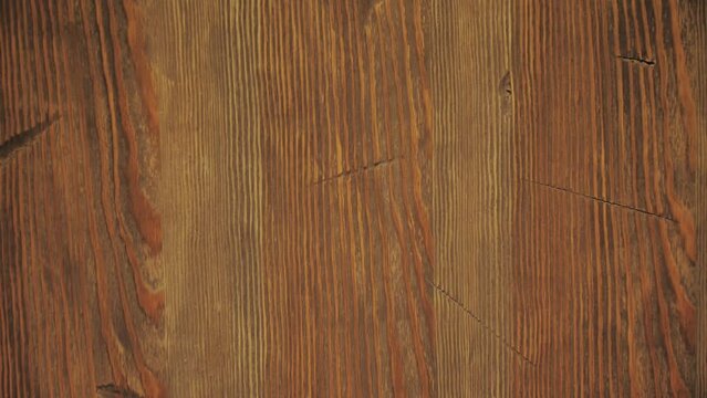 Close-up of wooden texture zoom in, old wooden board, slow motion