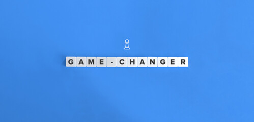 Game-changer Word and Concept Image. Letter Tiles on Flat Blue Background. Minimalist Aesthetics.