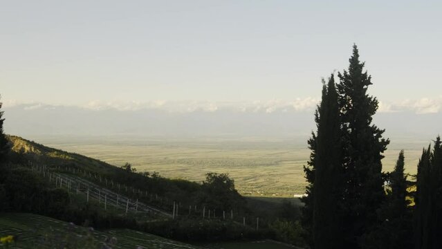 Peaceful Georgian landscape. View of the Caucasian ridge and valley near the Bodbe Monastery. Mountains, nature.