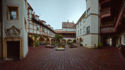 A courtyard surrounded by houses in an old German town. Ansbach, Bavaria Region Middle Franconia, Germany