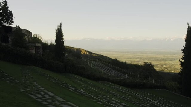 Peaceful Georgian landscape. View of the Caucasian ridge and valley near the Bodbe Monastery. Mountains, nature.