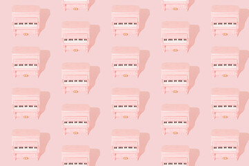 Pastel pink piano pattern on pastel pink background. Music, art,  love concept.