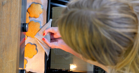 Top view of baking gingerbread, cookies in oven.