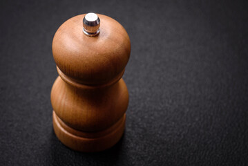 Beautiful wooden figured pepper shaker or salt shaker with a mill