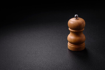 Beautiful wooden figured pepper shaker or salt shaker with a mill