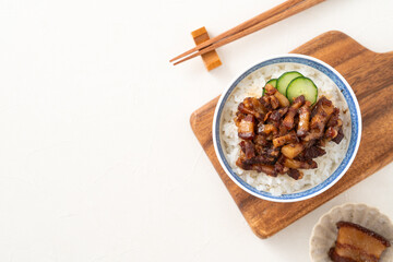 Braised pork belly meat over cooked rice, famous and delicious street food in Taiwanese restaurant.