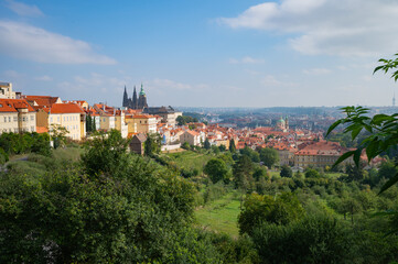 Fototapeta na wymiar Prague, Czech Republic - September 26, 2023 - View of the Prague skyline while climbing Petrin Tower.