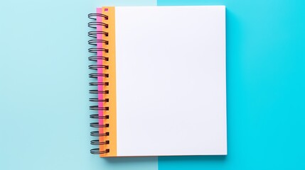 a spiral bound notebook with a white paper on it - obrazy, fototapety, plakaty