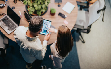 Successful Business Leaders Discussing Efficiency and Collaborating on New Projects for Better Productivity and Growth