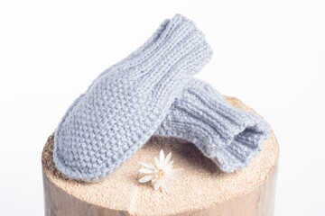 winter knitted woolen clothing gloves isolated on white background