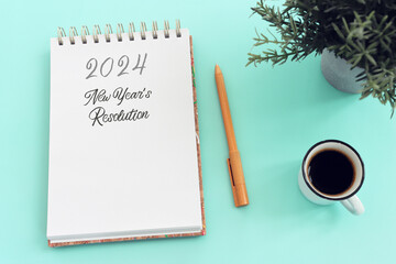 Business concept of top view 2024 new resolution list with notebook over pastel background