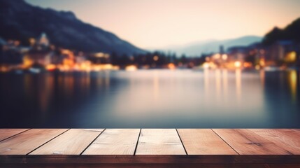 Empty wooden table top with blurred lakeside cafe on a gorgeous Italian lake in the evening. vacation concept. for mounting your product - obrazy, fototapety, plakaty