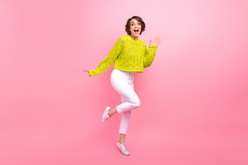 Fototapeta na wymiar Full length photo of cute impressed girl dressed neon sweater open mouth waving arm isolated pink color background