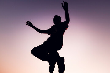 Fototapeta na wymiar silhouette of a person jumping