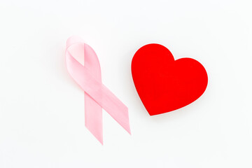 Pink ribbon with heart for world breast cancer day