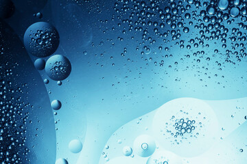air bubbles in fresh water, abstract blue background