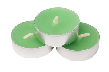 Green decorative tea light candles in aluminum holders stack isolated on white background