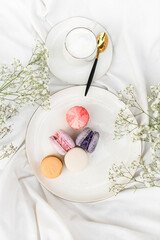 Bouquet of the tenderness white beautiful daisies on a white satin